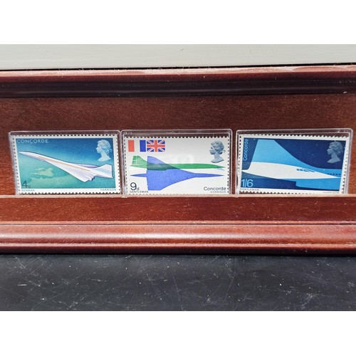 228 - A wooden mounted resin figure of Concorde showing Concorde taking off with the Air France insignia. ... 