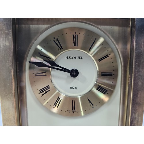229 - A vintage H.Samuel wooden, mantel clock with a mechanical movement, the front of the clock is glazed... 