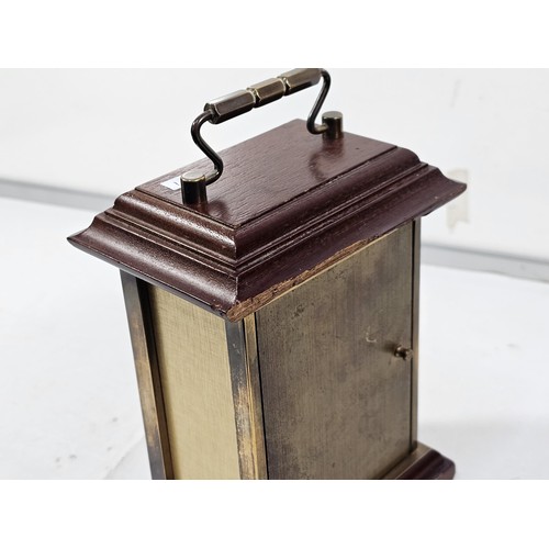 229 - A vintage H.Samuel wooden, mantel clock with a mechanical movement, the front of the clock is glazed... 