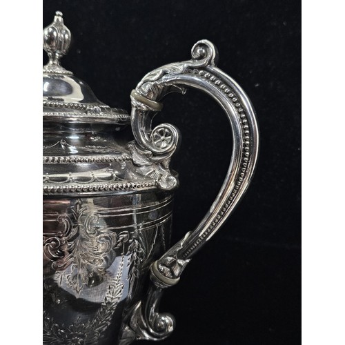 230 - A good quality silver plated teapot with Garland engraving around the sides, the teapot is in good o... 