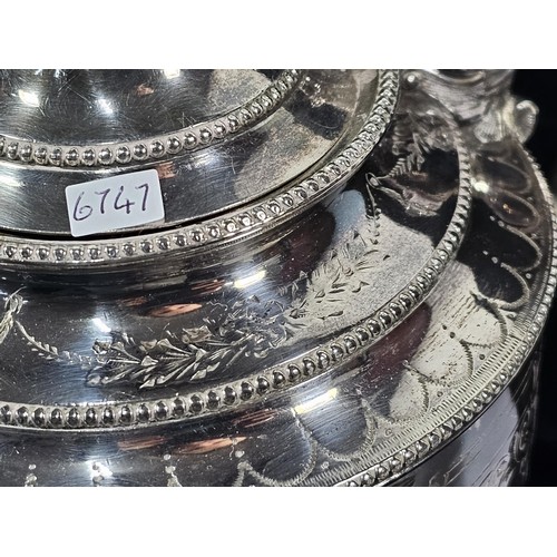 230 - A good quality silver plated teapot with Garland engraving around the sides, the teapot is in good o... 
