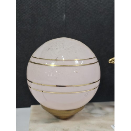 236 - A good quality vintage art deco lamp with an original spherical pink and gold shade in glass and a b... 