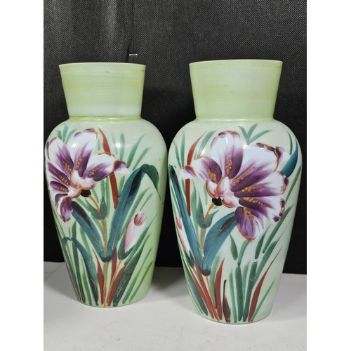 234 - A shelf full of collectable pieces to include a pair of hand painted Vaseline vases a hand painted f... 