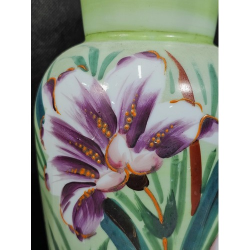 234 - A shelf full of collectable pieces to include a pair of hand painted Vaseline vases a hand painted f... 