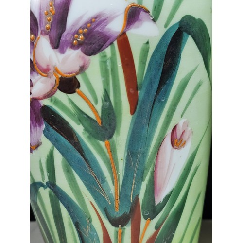 234 - A shelf full of collectable pieces to include a pair of hand painted Vaseline vases a hand painted f... 