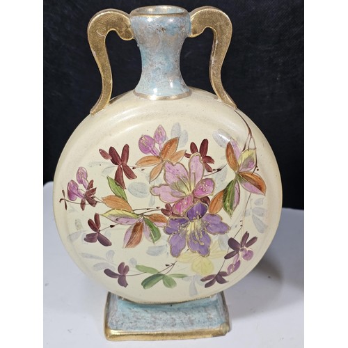 234 - A shelf full of collectable pieces to include a pair of hand painted Vaseline vases a hand painted f... 