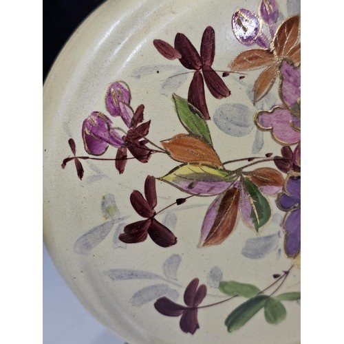 234 - A shelf full of collectable pieces to include a pair of hand painted Vaseline vases a hand painted f... 