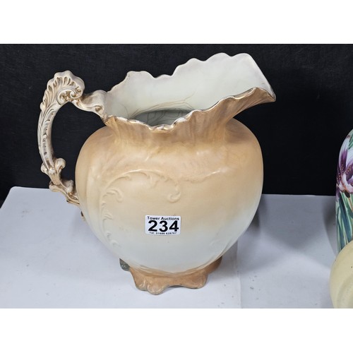 234 - A shelf full of collectable pieces to include a pair of hand painted Vaseline vases a hand painted f... 