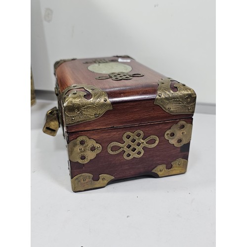 232 - A collection of 2x vintage oriental jewellery boxes, both with plastic Jade style panels, the taller... 