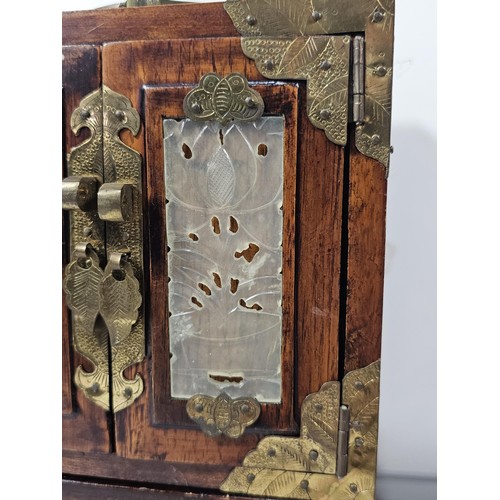 232 - A collection of 2x vintage oriental jewellery boxes, both with plastic Jade style panels, the taller... 