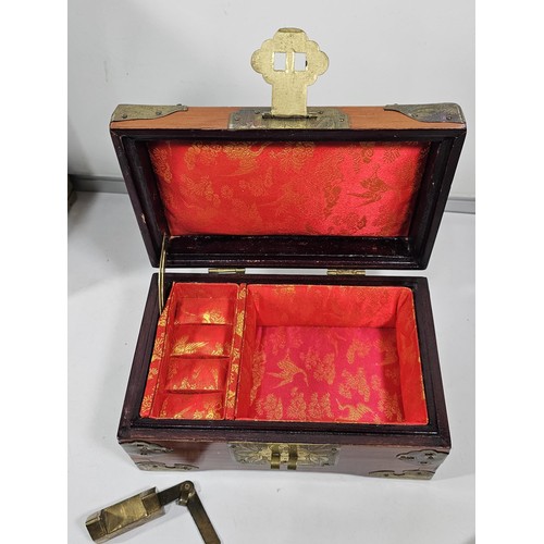 232 - A collection of 2x vintage oriental jewellery boxes, both with plastic Jade style panels, the taller... 