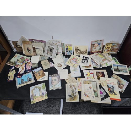 215B - A very large quantity of early vintage and some antique greeting cards and birthday cards etc along ... 