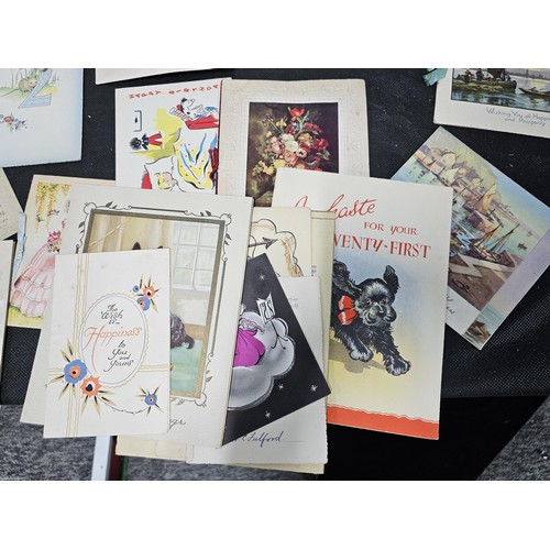 215B - A very large quantity of early vintage and some antique greeting cards and birthday cards etc along ... 