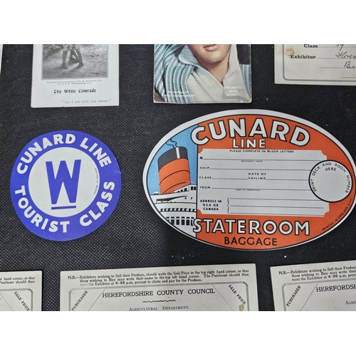 215C - A quantity of interesting antique ephemera to include 2x Cunard Line unused luggage labels a photogr... 