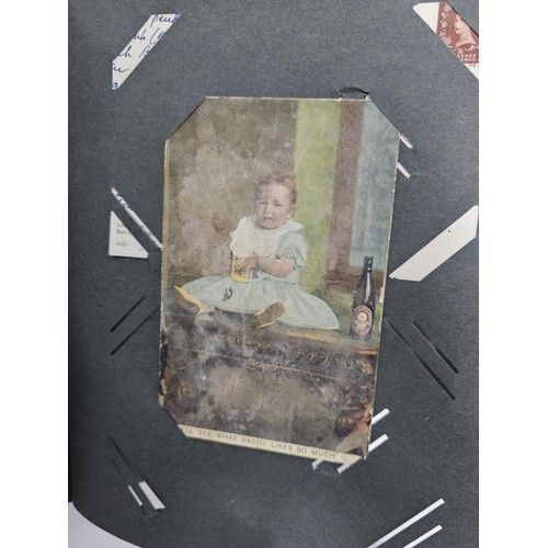 215E - Complete album of vintage and antique postcards to include humorous postcards photographic postcards... 