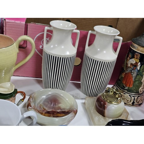 198 - 2x boxes containing a large collection of collectables to include 2x Hornsea ribbed vases in black a... 