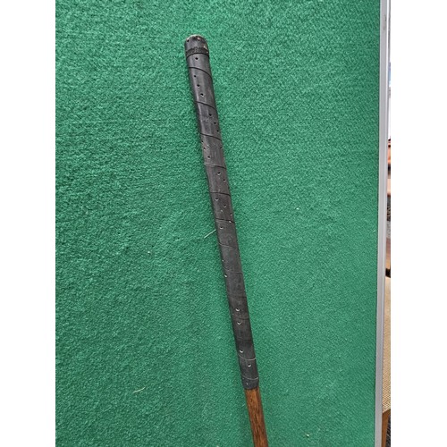 1 - A vintage material gun hardcase along with a cartridge and belt, also includes 2 vintage Hickory sha... 