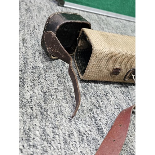 1 - A vintage material gun hardcase along with a cartridge and belt, also includes 2 vintage Hickory sha... 
