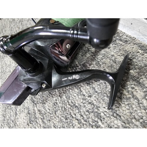 2 - 2 cork handled fishing rods, both are 2 piece with the corks and eyes in good order, complete with a... 