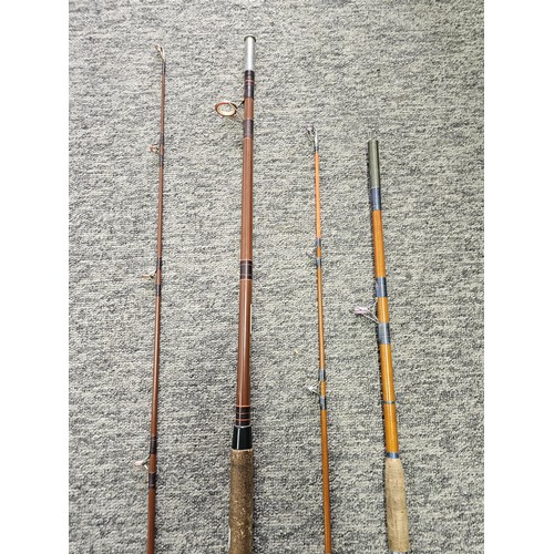 2 - 2 cork handled fishing rods, both are 2 piece with the corks and eyes in good order, complete with a... 