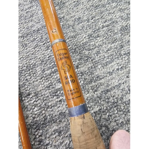 2 - 2 cork handled fishing rods, both are 2 piece with the corks and eyes in good order, complete with a... 