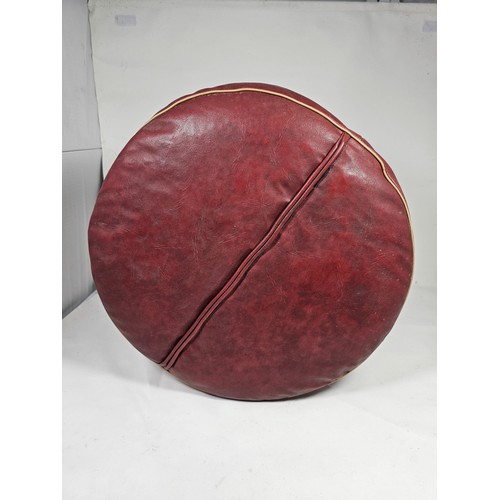 4 - A vintage mid century geometric patterned red beige and green pouffe, in good order with a height of... 