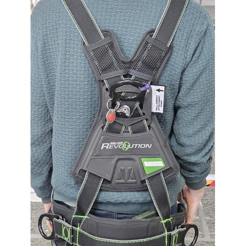 11 - Miller “Revolution” full‑body safety harness, black webbing with green stitching, fitted with multip... 