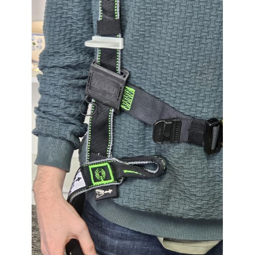 11 - Miller “Revolution” full‑body safety harness, black webbing with green stitching, fitted with multip... 
