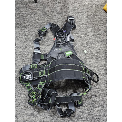 11 - Miller “Revolution” full‑body safety harness, black webbing with green stitching, fitted with multip... 