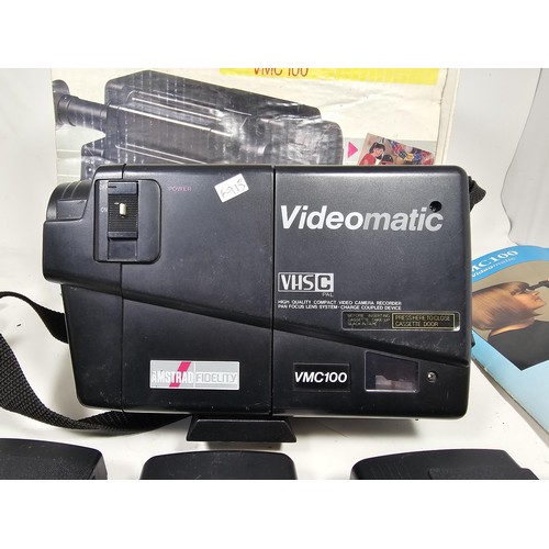 19 - An original boxed Amstrad Videomatic VMC100 portable VHS recorder complete with camera, 3x batteries... 