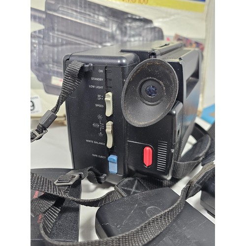 19 - An original boxed Amstrad Videomatic VMC100 portable VHS recorder complete with camera, 3x batteries... 
