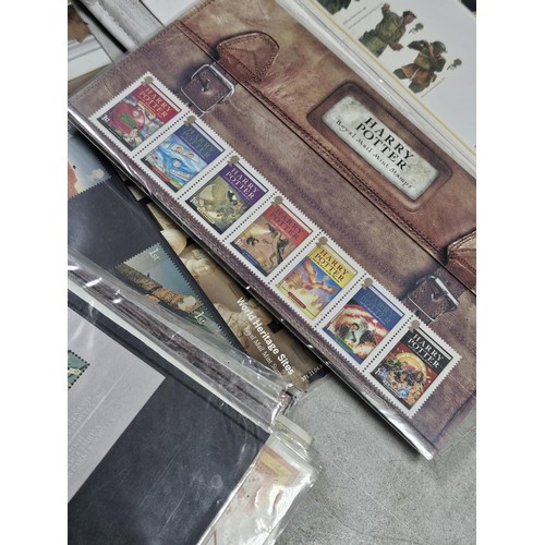 16 - A collection of First day covers and stamps all in sealed packets covering various subjects to inclu... 
