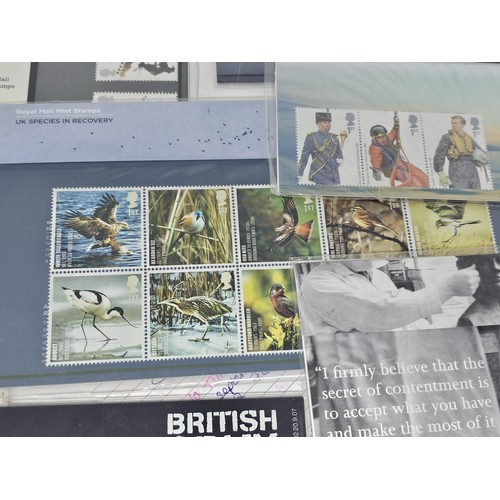 16 - A collection of First day covers and stamps all in sealed packets covering various subjects to inclu... 