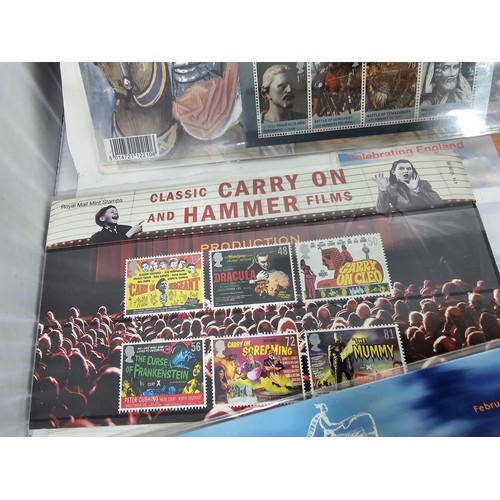 16 - A collection of First day covers and stamps all in sealed packets covering various subjects to inclu... 