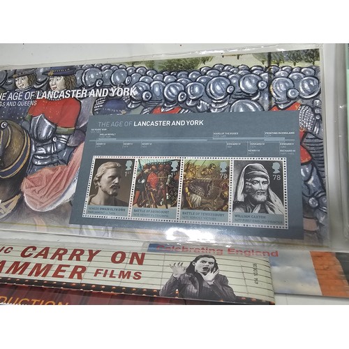16 - A collection of First day covers and stamps all in sealed packets covering various subjects to inclu... 