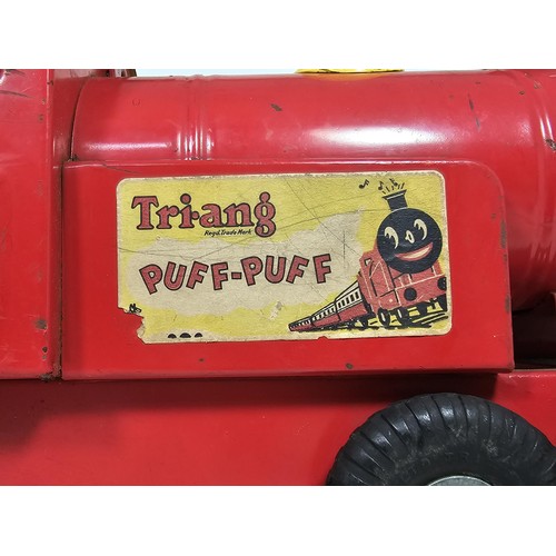 17 - A Tri-ang 'Puff-Puff' lithographed tin plate push along locomotive, red and ye;ow livery with a cart... 