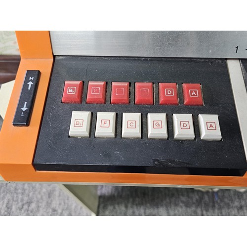 44 - A vintage Bontempi Hit 1 'Hit Organ' electronic organ in an orange and cream plastic casing, model n... 