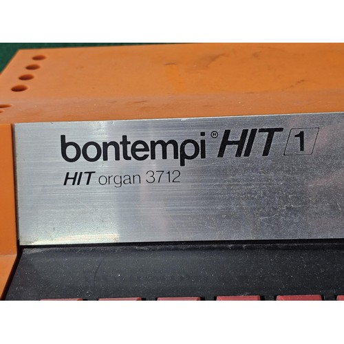 44 - A vintage Bontempi Hit 1 'Hit Organ' electronic organ in an orange and cream plastic casing, model n... 