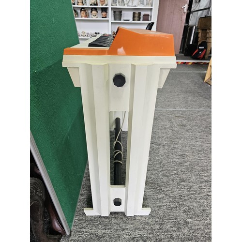 44 - A vintage Bontempi Hit 1 'Hit Organ' electronic organ in an orange and cream plastic casing, model n... 