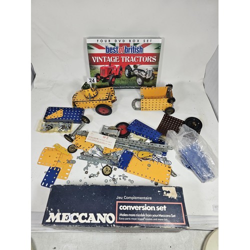 24 - A small quantity of Meccano, to include a partially built armoured car and a trailer along with a co... 