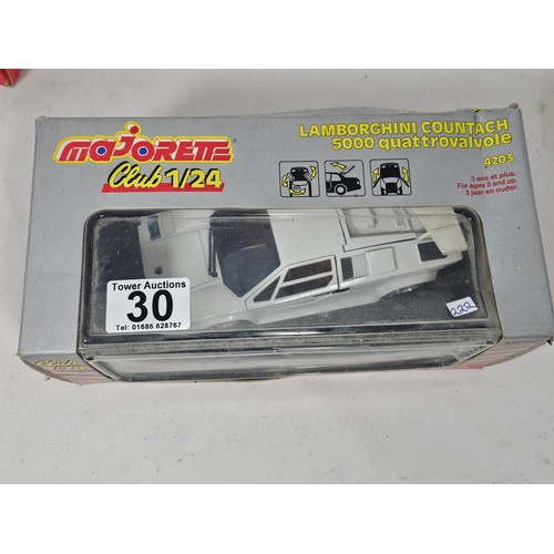 30 - 3x boxed Majorette Club 1/24 cars to include a Porsche 944 cabriolet, a Lamborghini Countach and a C... 