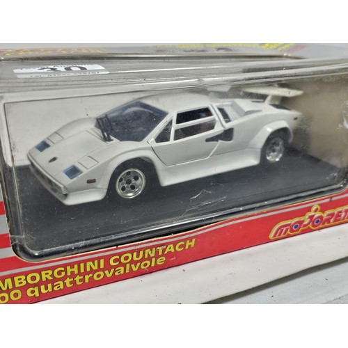 30 - 3x boxed Majorette Club 1/24 cars to include a Porsche 944 cabriolet, a Lamborghini Countach and a C... 