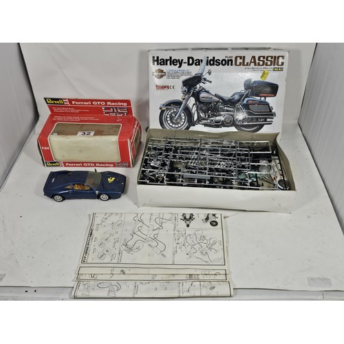 32 - A boxed Harley Davidson 1/12 scale model kit by IMAI, appears complete, along with a Revell Ferarri ... 