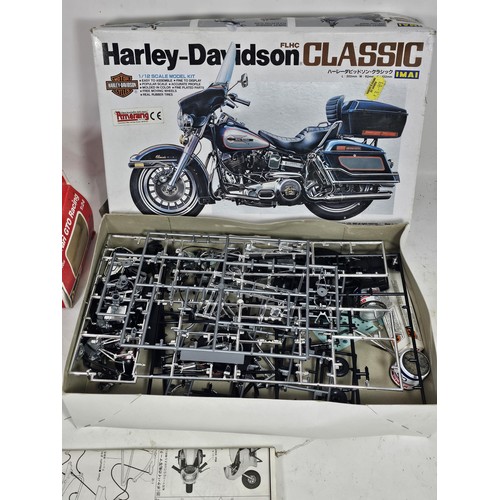 32 - A boxed Harley Davidson 1/12 scale model kit by IMAI, appears complete, along with a Revell Ferarri ... 