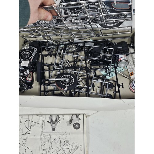 32 - A boxed Harley Davidson 1/12 scale model kit by IMAI, appears complete, along with a Revell Ferarri ... 
