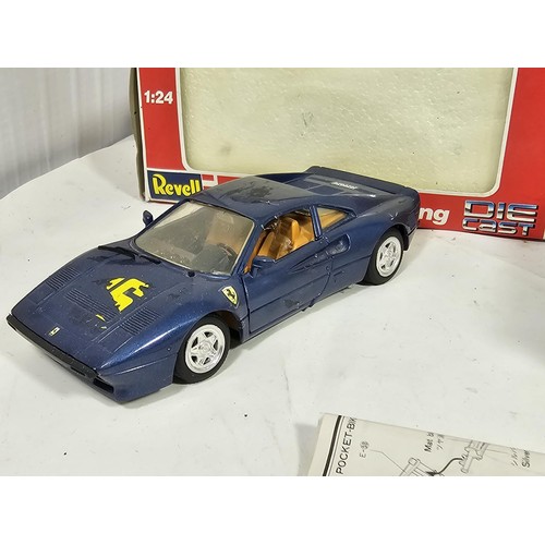 32 - A boxed Harley Davidson 1/12 scale model kit by IMAI, appears complete, along with a Revell Ferarri ... 