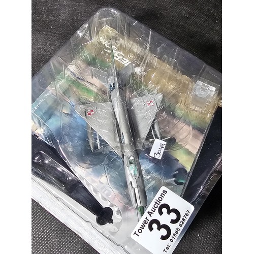33 - 2x boxed planes with stands to include a Polish 1999 Mikoyan MIG-21MF 'Fishbed-J' and a Dassault Raf... 