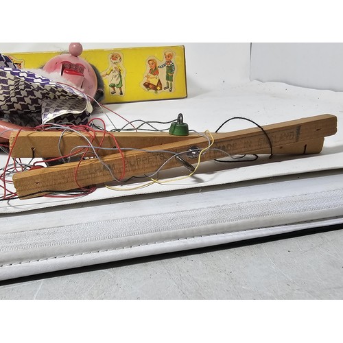 34 - An original boxed Pelham Puppet, the puppet is in traditional attire, the puppet requires attention,... 