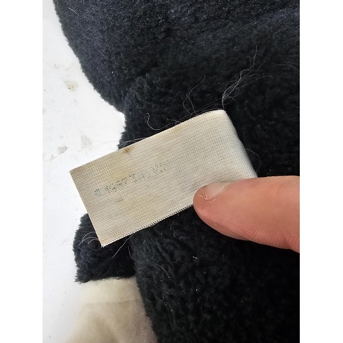 35 - A collection of Mickey Mouse items to include a genuine Disney Mickey mouse plush toy with label, a ... 