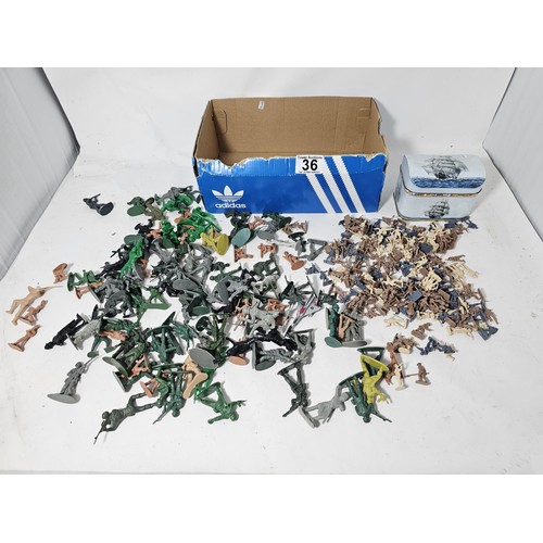 36 - A box containing a collection of assorted plastic soldiers from various periods in history to includ... 